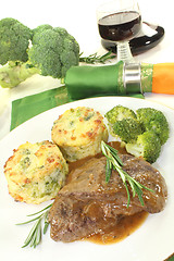 Image showing Venison medallions with potato gratin and rosemary