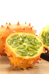 Image showing horned melon on a wooden board