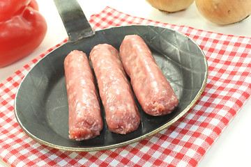 Image showing Salsiccia in a pan on napkin