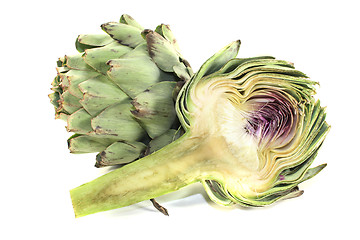 Image showing sliced and whole artichokes