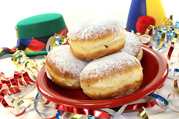 Image showing Pancakes with streamers and carnival hats