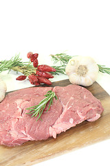 Image showing Ribeye steak with garlic, chilli and rosemary