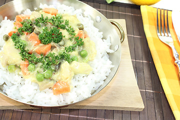 Image showing chicken frikassee with rice and mushrooms