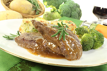 Image showing Venison medallions with gratin potatoes