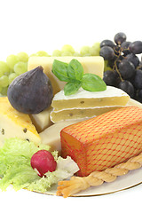 Image showing Pieces of cheese with grapes