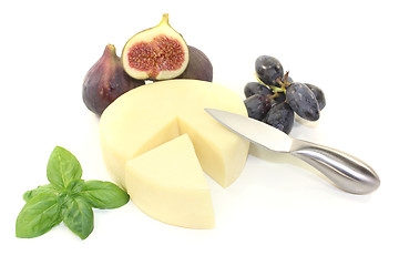 Image showing Cheese piece with knife