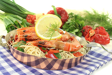 Image showing Shrimp with mie noodles and coriander
