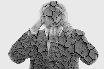 Image showing double exposure of depressed business man and dry ground backgro