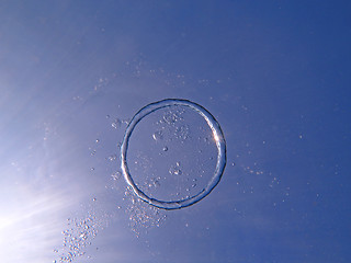 Image showing Bubble ring  from the air rises upwards the sun.