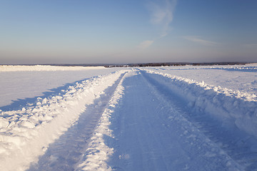 Image showing the road to a field  