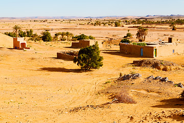 Image showing sahara      in morocco  palm  and  historical village 