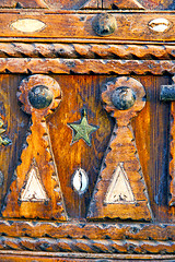 Image showing grey metal rusty      morocco in africa the old wood  shell padl