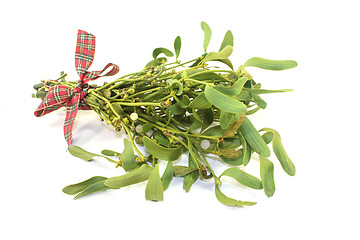 Image showing Mistletoe with berries and ribbon