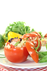 Image showing stuffed tomatoes with pasta salad and basil