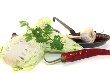 Image showing pointed cabbage with parsley and garlic