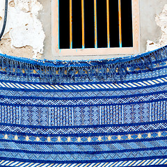 Image showing blue window in morocco africa old construction and brown wall re