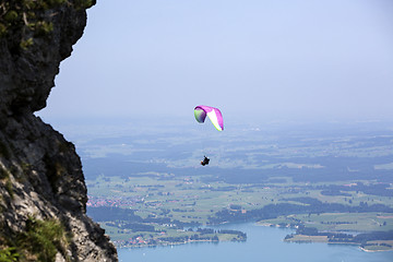 Image showing Paraglider flying over Bavarian lake Forggensee