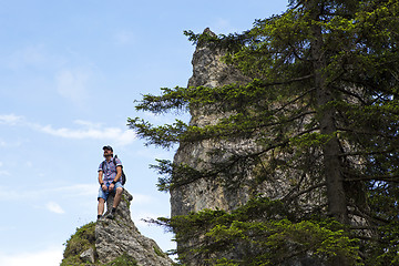 Image showing Male hiker on mountain top