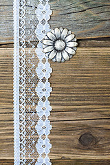 Image showing vintage button flower  and lace tape