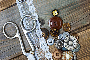 Image showing vintage buttons, lace, and a dressmaker scissors