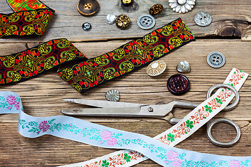 Image showing vintage buttons, lace, and a dressmaker scissors