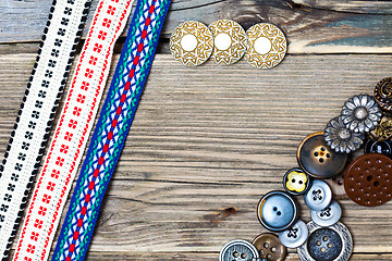 Image showing vintage buttons and ancient ribbons