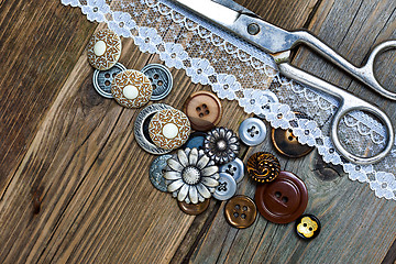 Image showing vintage buttons, lace, and a dressmaker scissors