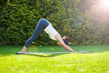 Image showing beautiful adult woman practicing yoga