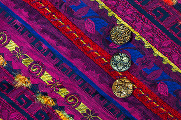 Image showing vintage tape with embroidered ornaments and old buttons