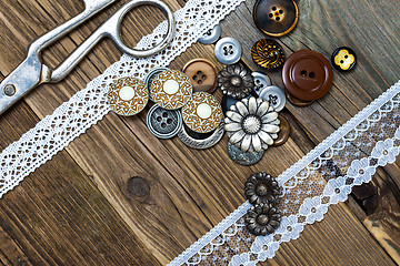 Image showing vintage buttons, lace, and a dressmaker scissors