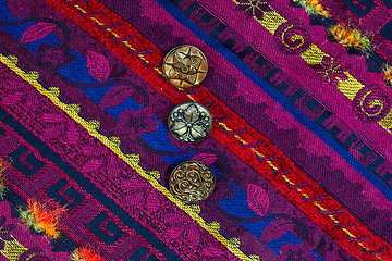 Image showing vintage band with embroidered ornaments and old buttons