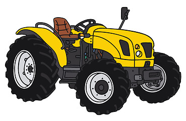 Image showing Yellow small tractor