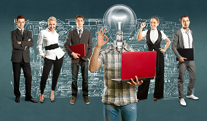 Image showing Business Team With Lamp Head