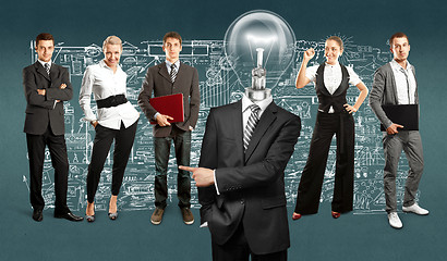 Image showing Business Team With Lamp Head