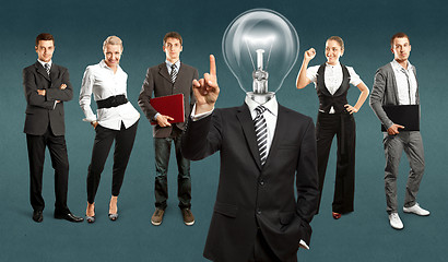 Image showing Business Team With Lamp Head