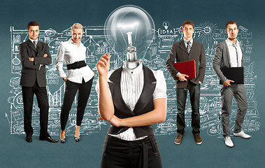 Image showing Business Team With Lamp Head