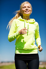 Image showing woman jogging outdoors