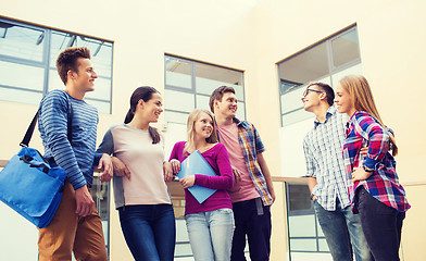 Image showing group of smiling students outdoors