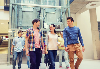 Image showing group of smiling students with paper coffee cups