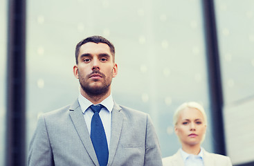 Image showing businessman and businesswoman outdoors