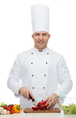 Image showing happy male chef cook cooking food