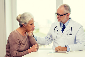 Image showing senior woman and doctor with tablet pc