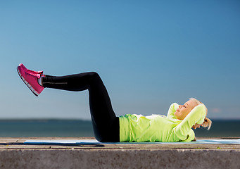 Image showing woman doing sports outdoors