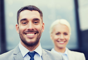 Image showing close up of smiling businessmen