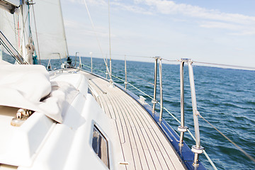 Image showing close up of sailboat or sailing yacht deck and sea