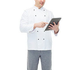 Image showing close up of happy male chef cook holding tablet pc
