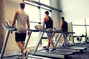 Image showing men exercising on treadmill in gym