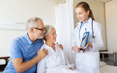 Image showing senior woman and doctor with tablet pc at hospital