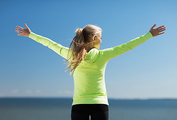 Image showing woman doing sports outdoors