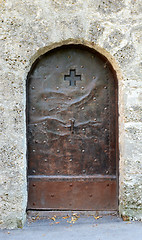 Image showing Old studded metal door